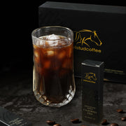 Wildstudcoffee in cup